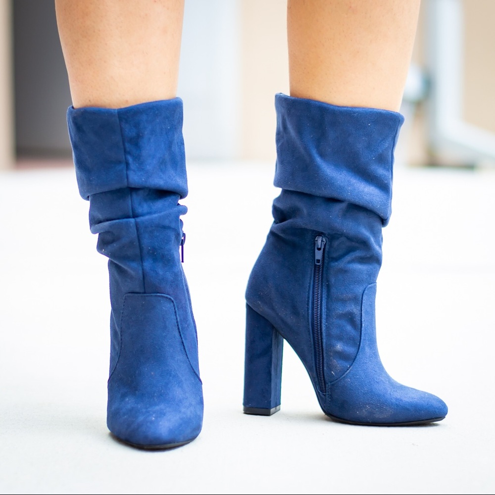 Navy blue heeled booties. Very stylish and pretty